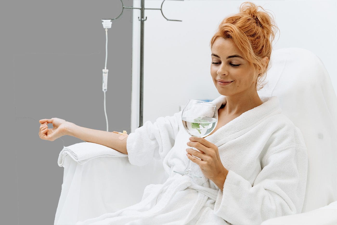 Woman receiving hydration therapy at a IV Vitamin Spa Woman receiving hydration therapy at a IV Vitamin Spa